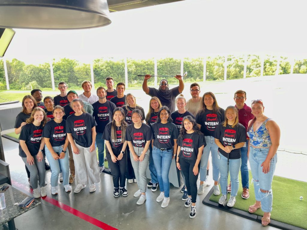 interns in group at golf