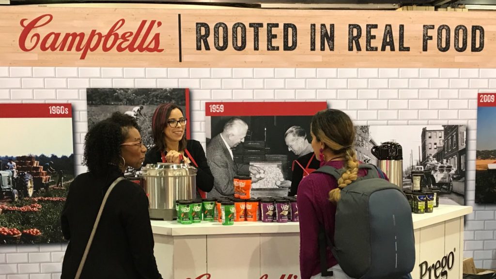 Giving out samples at FNCE