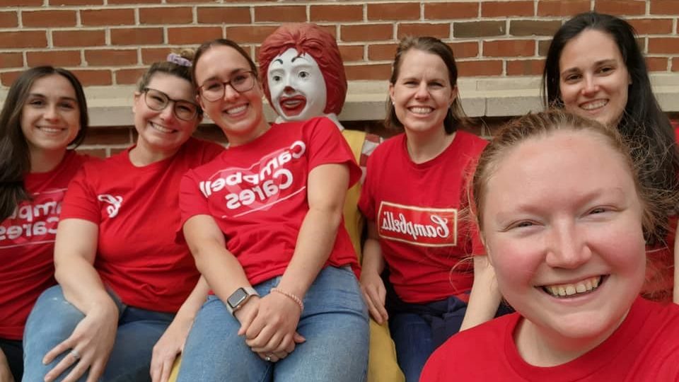Employee selfie with Ronald McDonald statue