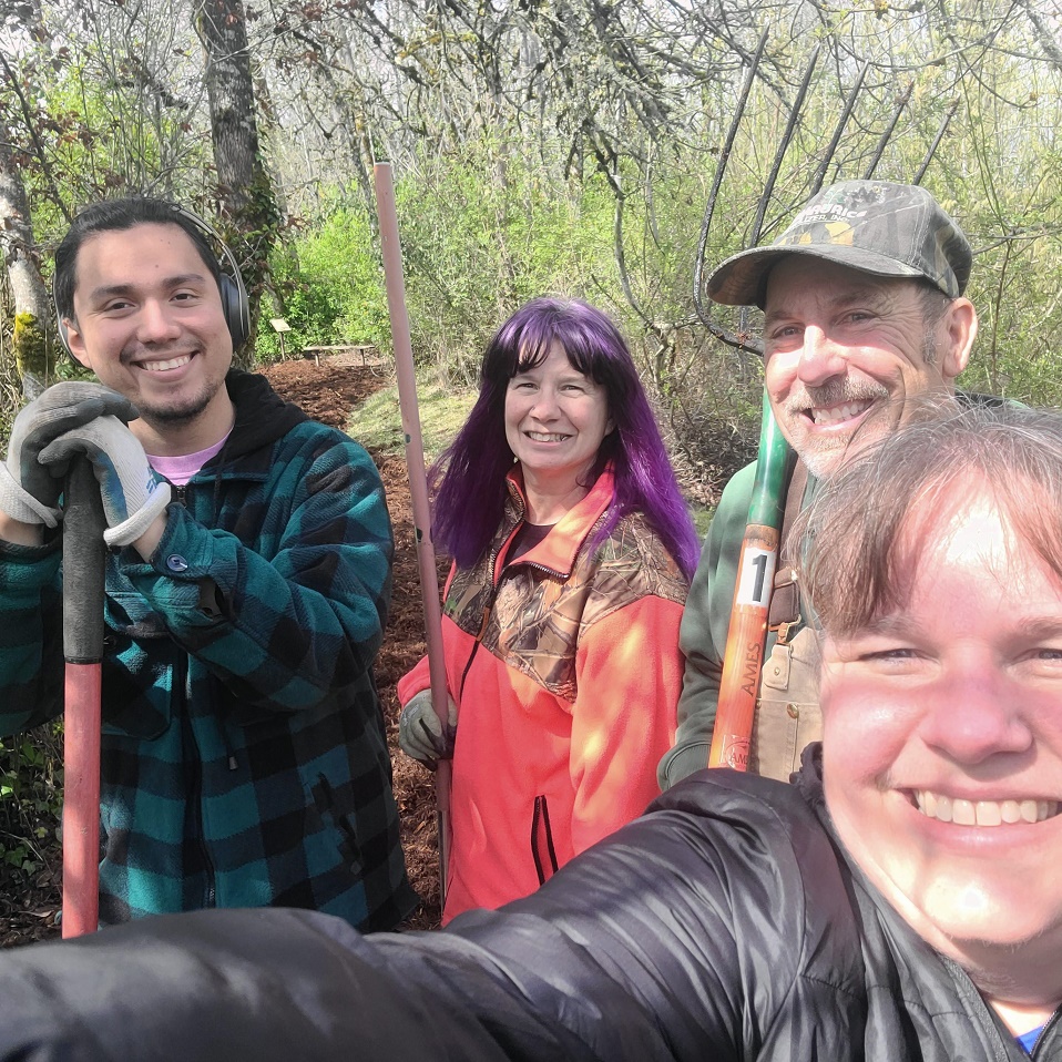 Selfie of Salem employees posing at outdoor cleanup